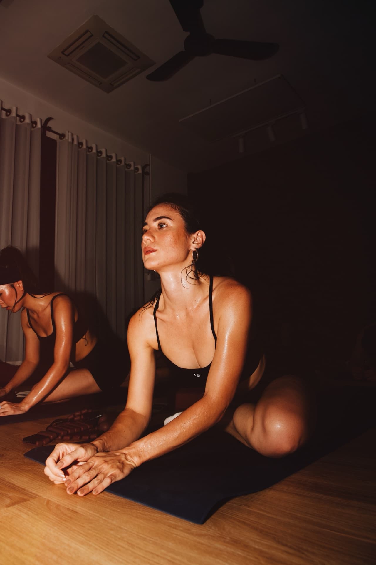 Yoga Flow — red-lit studio placeholder